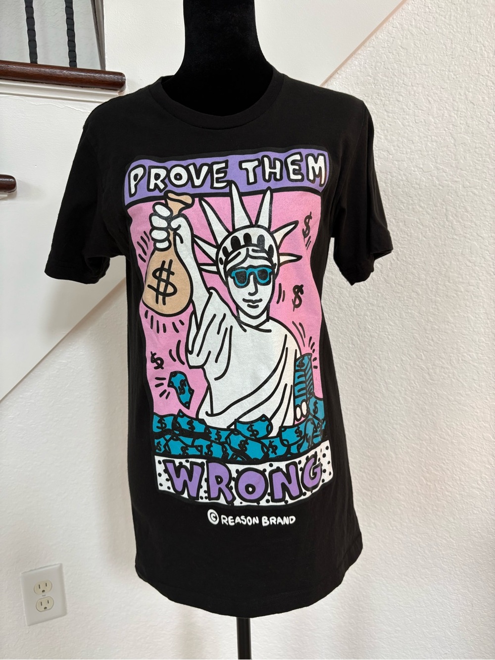 Reason Black Tee with Pink, Teal and Purple Graphic - "Prove Them Wrong"